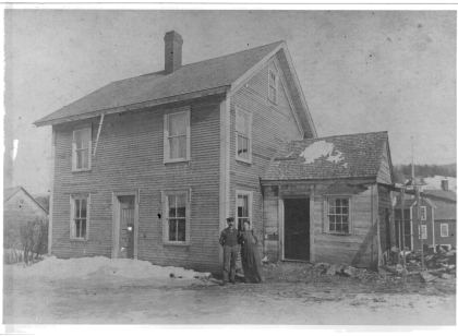Paquin home, Lower Cabot, early 1900's. In background, Haines Woolen Mill. (Picture from Lois Paquin collection, donated by L. H. Spencer.) Shown here are:…
