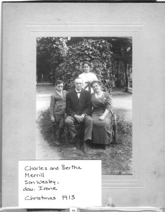 Charles and Bertha Merrill, son Wesley, dau. Irene. Christmas 1913