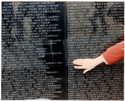 Glendon R. Barnett's name on the Vietnam Veterans Memorial wall (unlabeled in the album).