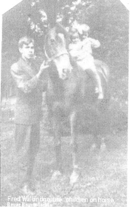 Fred Walbridge, unk. children on horse. (Bessie Bean collection.)